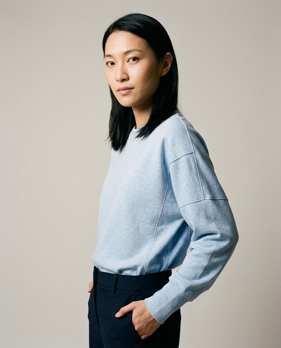 Women's Crew Neck Sweatshirt in Light Blue, studio three-quarter view
