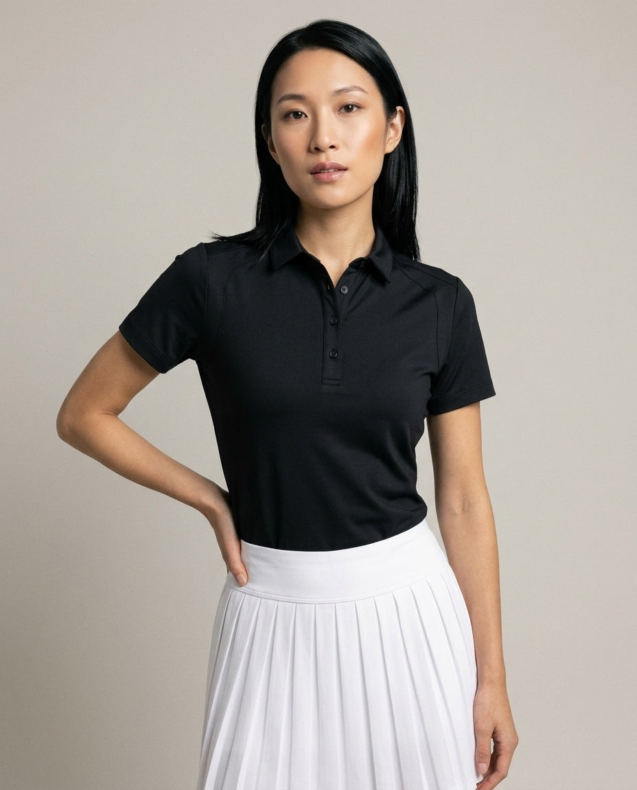 Women's SwingFree™ Performance Polo in Black, studio front view