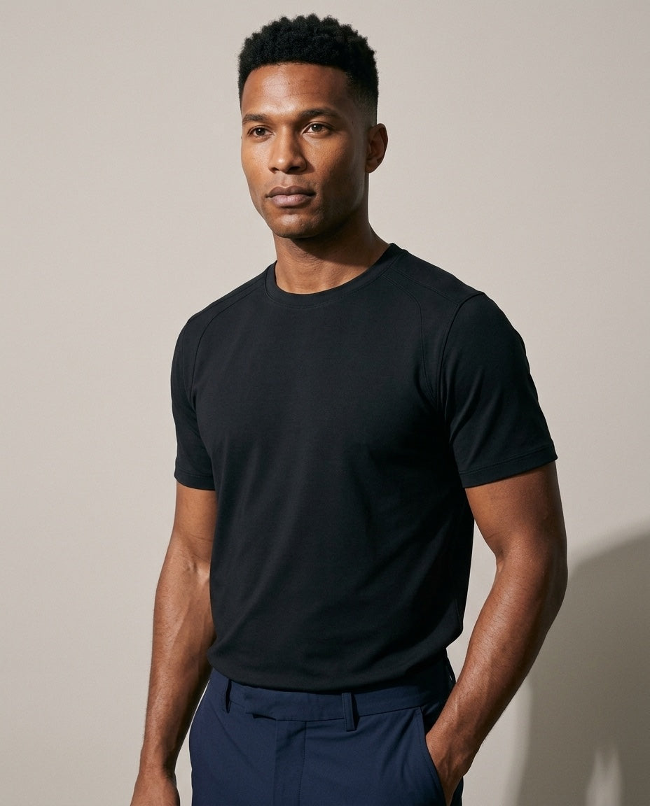 Men's SwingFree™ Performance Crew Tee in Black, studio three-quarter view