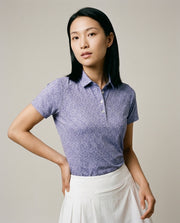 Women's 4 Button Lavender Floral Polo with SwingFree™ Performance in Lavender Floral, studio front view