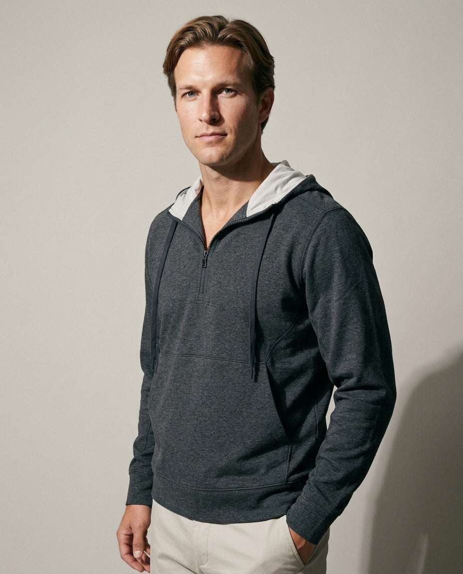 Men's ¼ Zip Hooded Pullover in Charcoal, studio three-quarter view