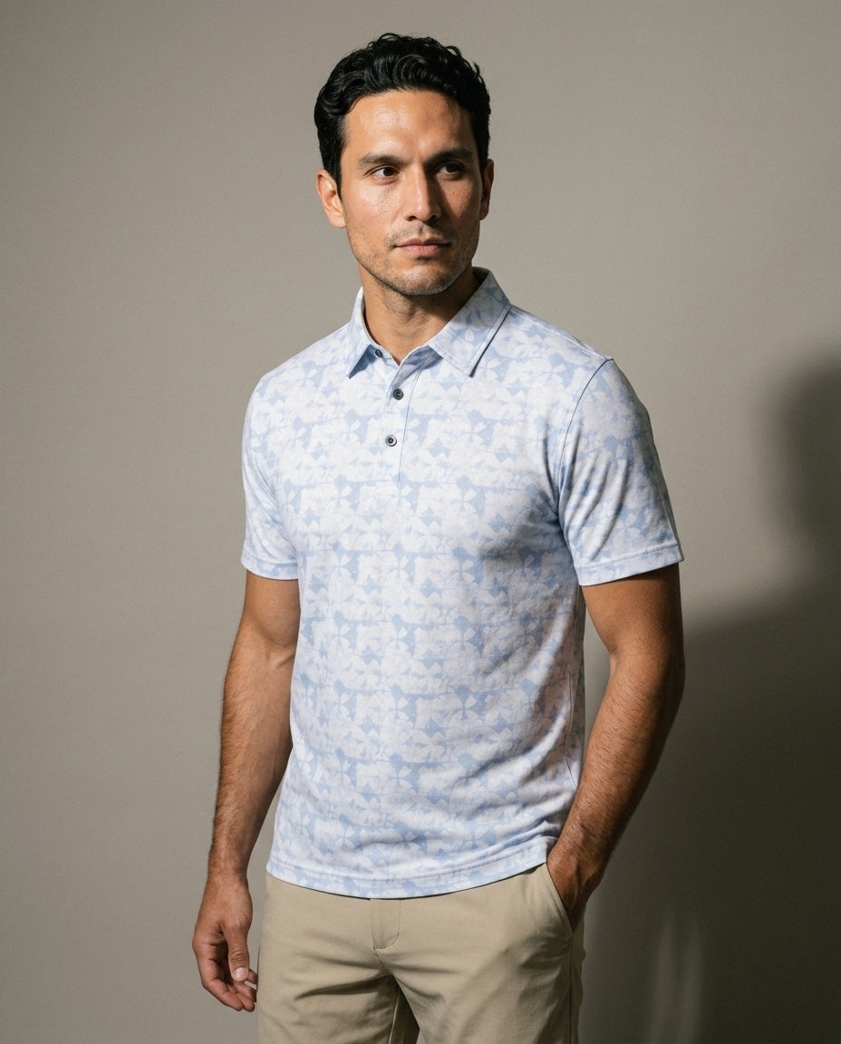 Men's 3 Button Light Blue Abstract Pique Polo in Light Blue Abstract, studio three-quarter view