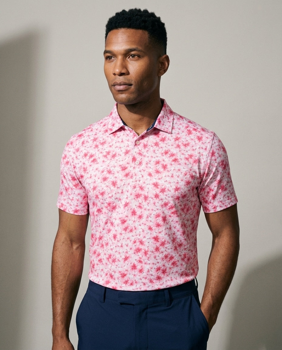 Men's Performance Hawaiian Floral Polo in Pink, studio three-quarter view