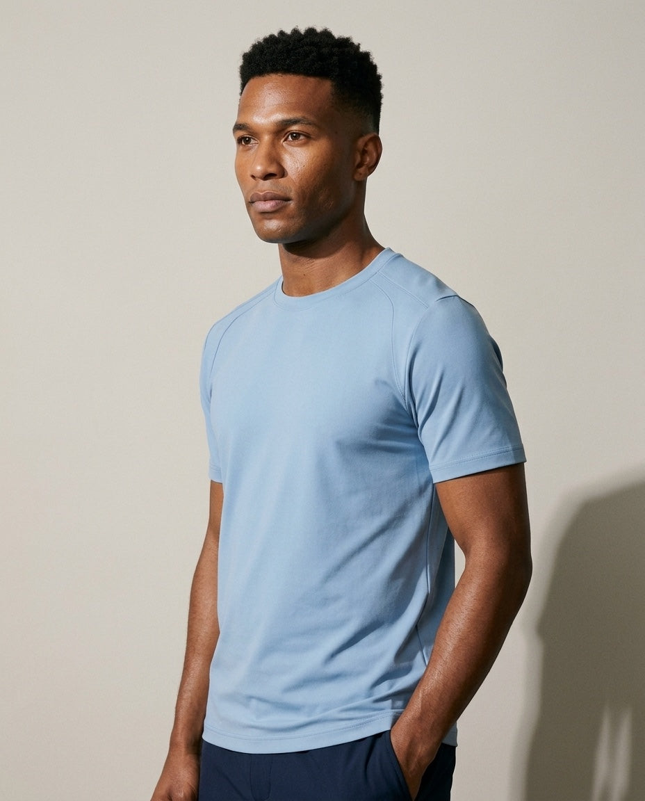 Men's SwingFree™ Performance Crew Tee in Sky Blue, studio three-quarter view