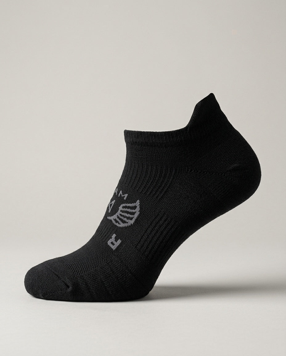 Men's Low Cut Golf Sock in Black, studio three-quarter view