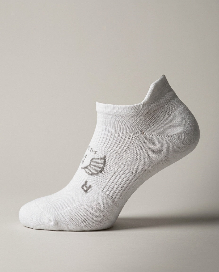 Men's Low Cut Golf Sock in White, studio three-quarter view