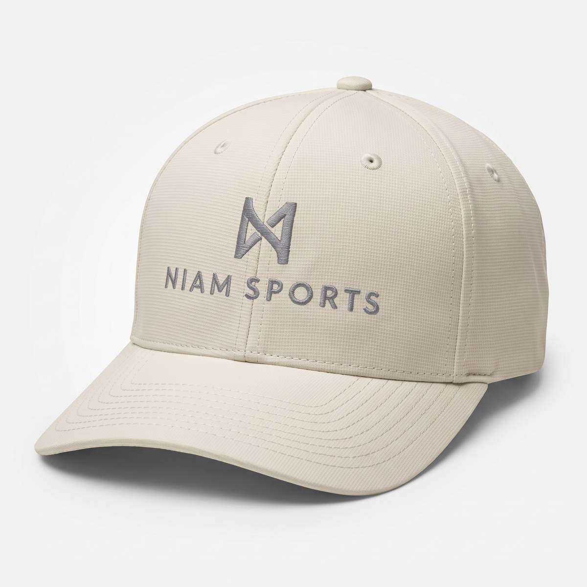 NIAM Sports Performance Golf Cap in Stone, structured five-panel crown with pre-curved visor and gray embroidered logo