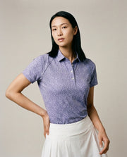 Women's 4 Button Lavender Floral Polo with SwingFree™ Performance in Lavender Floral, studio front view