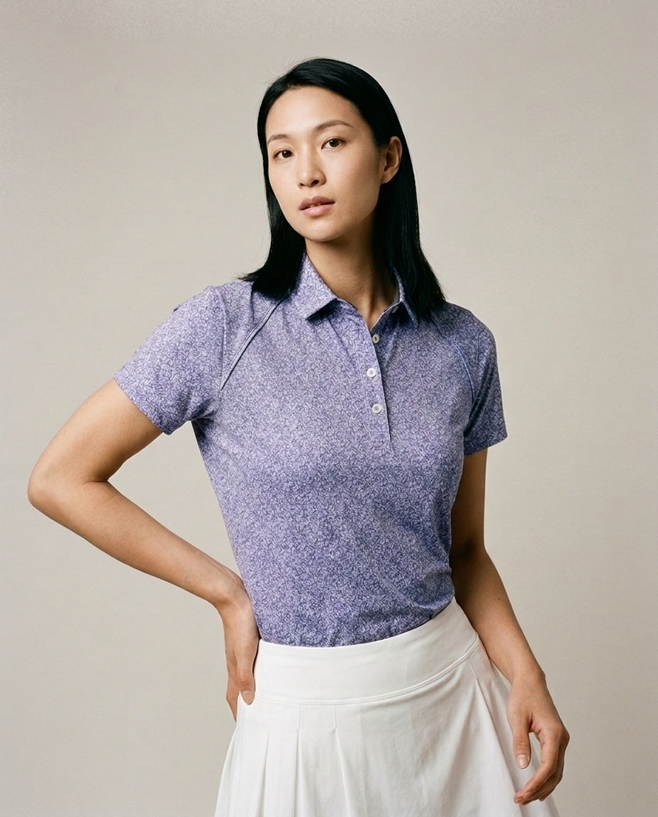Women's 4 Button Lavender Floral Polo with SwingFree™ Performance in Lavender Floral, studio front view
