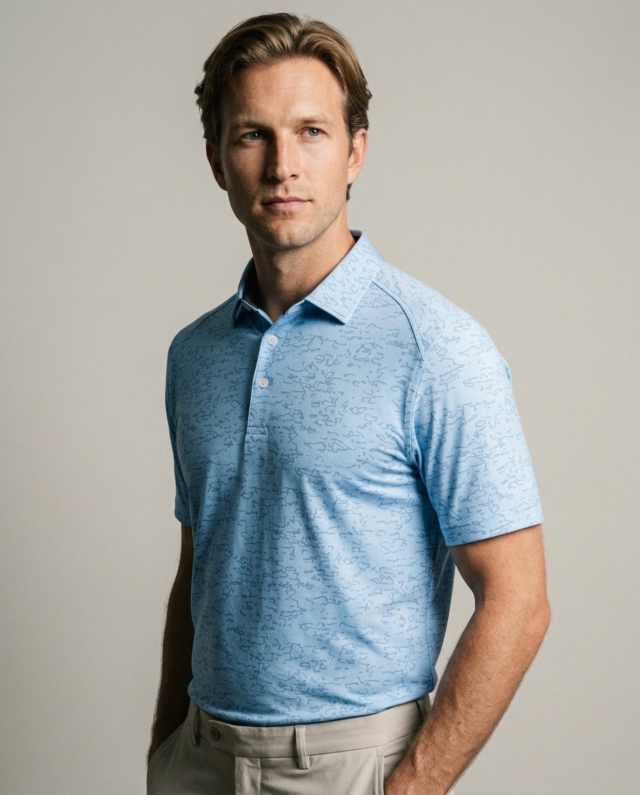 Men's Vieques Polo with SwingFree™ Technology in Blue Print, studio three-quarter view