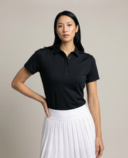Women's SwingFree™ Performance Polo in Black, studio front view