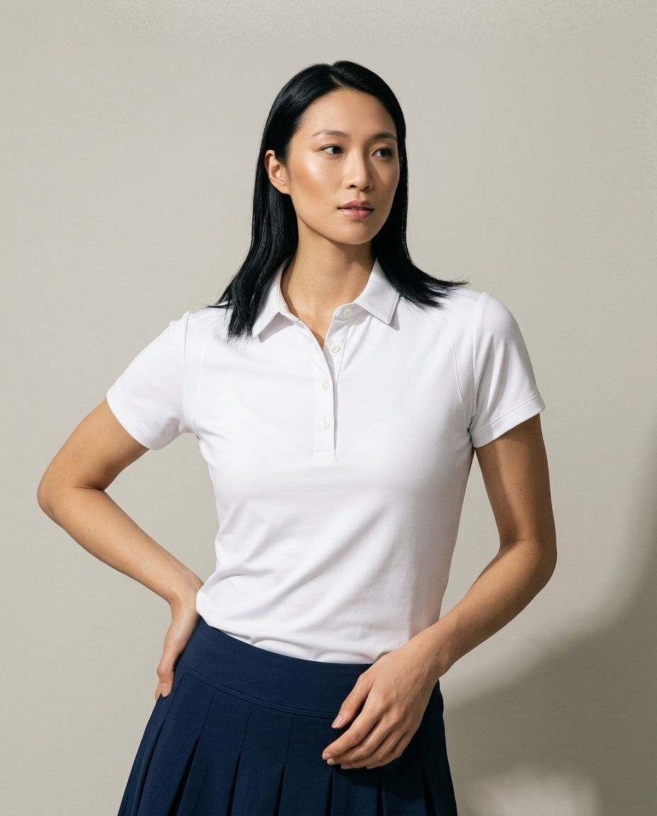 Women's SwingFree™ Performance Polo in White, studio front view